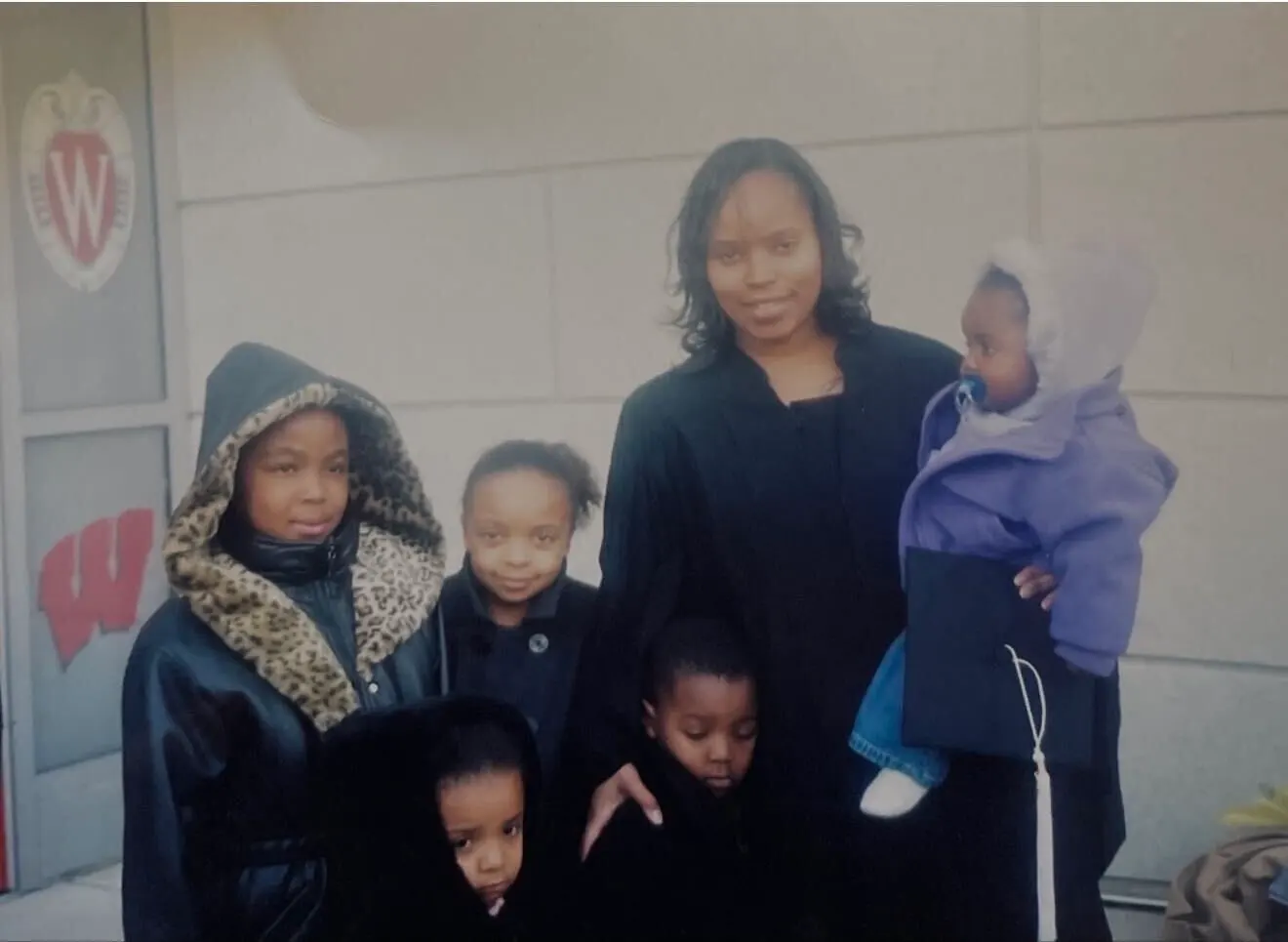 An earlier family photograph outside a University of Wisconsin building